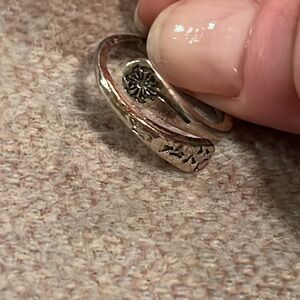 Adjustable dandelion silver toned ring